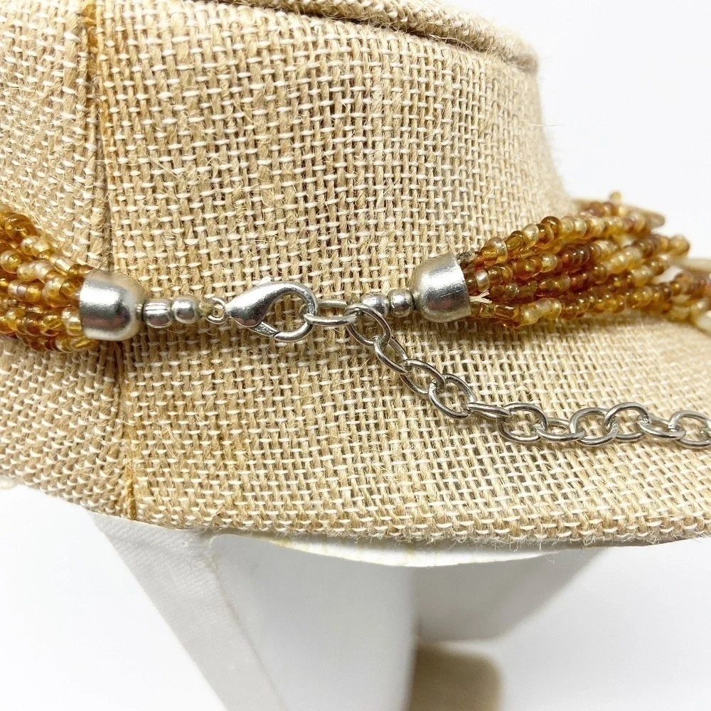 8 Strands of Brown & Amber Beaded Necklace